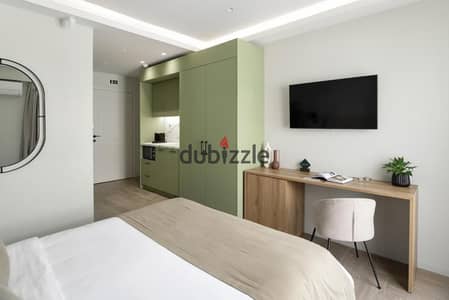 For investment and quick profit, an apartment with a down payment of 550 thousand and installments of 10 years in the final phase in Taj City, a location directly on Suez for sale in front of the airport near Sheraton