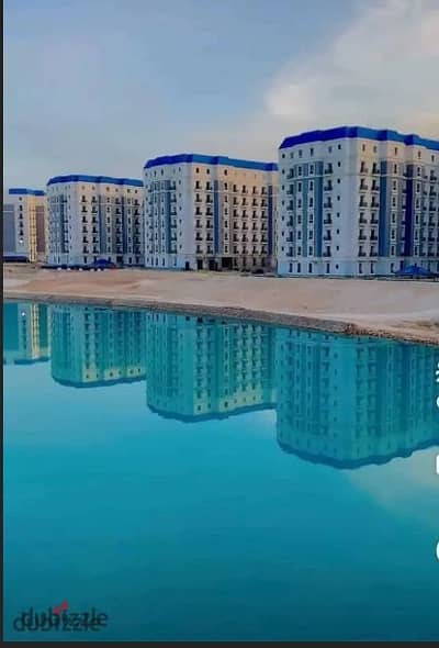 Half price apartment in the Latin Quarter of New Alamein, ready for immediate occupancy, fully finished, sea view, and the towers are ready for viewin