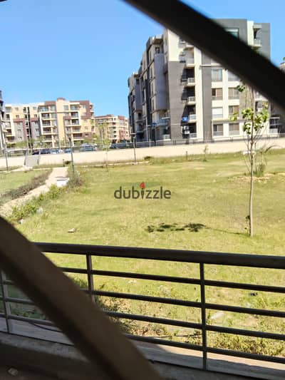 For rent, an apartment of 150 meters on the ground with a garden view in Janah Compound, 6 October