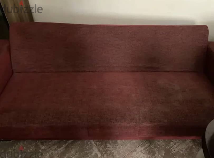 A three seats sofa - burgundy - sofa bed 1
