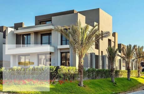 A distinctive standalone villa, ready for viewing, featuring a swimming pool and an elevator inside the villa, with an open view of the landscape, located in New Cairo on American University Street, next to Katameya Dunes and Hassan Allam, near 90th Stree