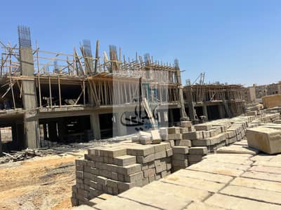Ground Apartment with Garden for sale with installments, Near Delivery, in West Clay Compound in Fron of Mall of Arabia, 165 M, in 6th of October City