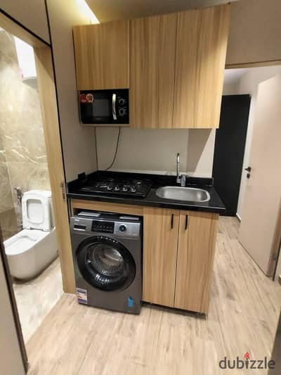 Hotel studio for rent in October in front of Msa University modern furnishings