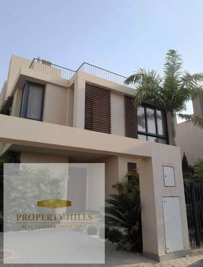 A villa overlooking a landscaped area, ready for immediate occupancy, from Sodic at the lowest price in the market.