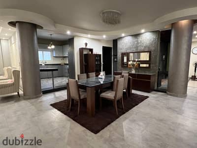 Luxury ground floor apartment with private garden and private entrance for rent in South Academy (Zone W), near Cairo Festival City, Downtown Mall, and North 90th St!