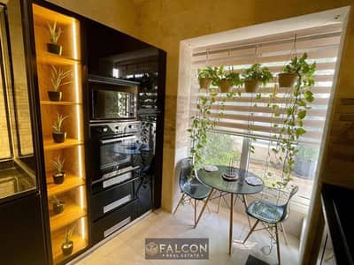 studio with garden for sale in Taj City compound, opposite Cairo Airport and 5 mins from Nasr City.