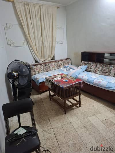 Furnished studio in Maadi side street behind Maadi ambulance first floor staircase consisting of room and living room bathroom kitchen natural gas