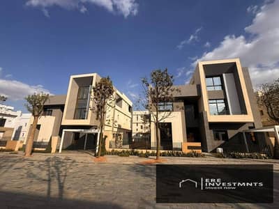 Lowest price corner townhouse (resale) with a direct view of the lagoon, in a prime location in Saada, in the heart of New Cairo - with payment facili