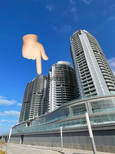 For a quick sale at the old price, a fully finished, ready-to-move-in apartment with air conditioning in Alamein Towers, 156 sq m, double sea and lago