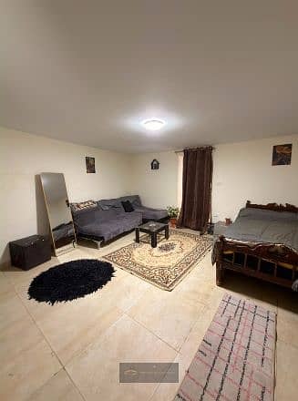 A distinctive studio for rent in the Ninth District | Sheikh Zayed – fully furnished ground floor with a private entrance and a parking space