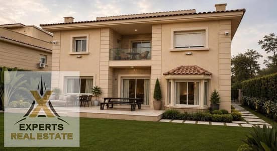 Standalone villa for sale in Madinaty, Model [ E ], featuring a stunning view of the lakes.