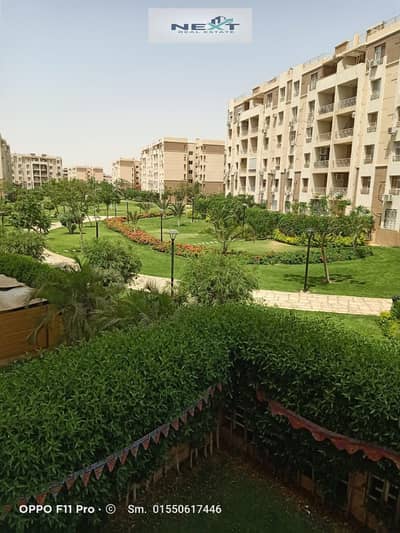 For rent in Madinaty, a new law apartment, 96 sq m in B7, special finishing, wide garden view, unobstructed sea view, very close to services, steps fr