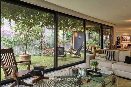 "Great deal" 3-bedroom with private garden in Taj City. Prime location, Delivery soon, and a 10-year installment plan.
