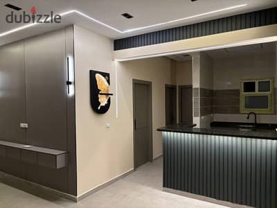 Ground floor apartment with garden for sale in Degla Compound, October, near Nawal El-Degwy University and October neighborhoods.