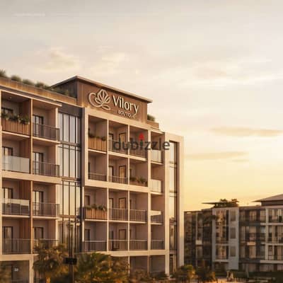 75 sqm finished hotel unit for sale at Vilory Hotel next to Emaar Cairo Gate Dollar returns 5% down payment & installments up to 10 years