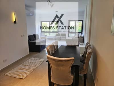 Fully Furnished Apartment with Private Garden for Rent in Fifty Square, Featuring an Elegant Design and Prime Location, Perfect for Comfortable Family