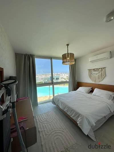 own a two-bedroom chalet first row on Crystal Lagoon next to Modon and Sea Shore Hyde Park Almaza Bay