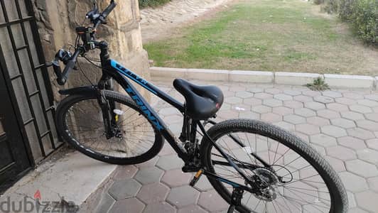 عجله trinx  m126 سرعات مقاس 29 ب اللون الازرق و الاسود