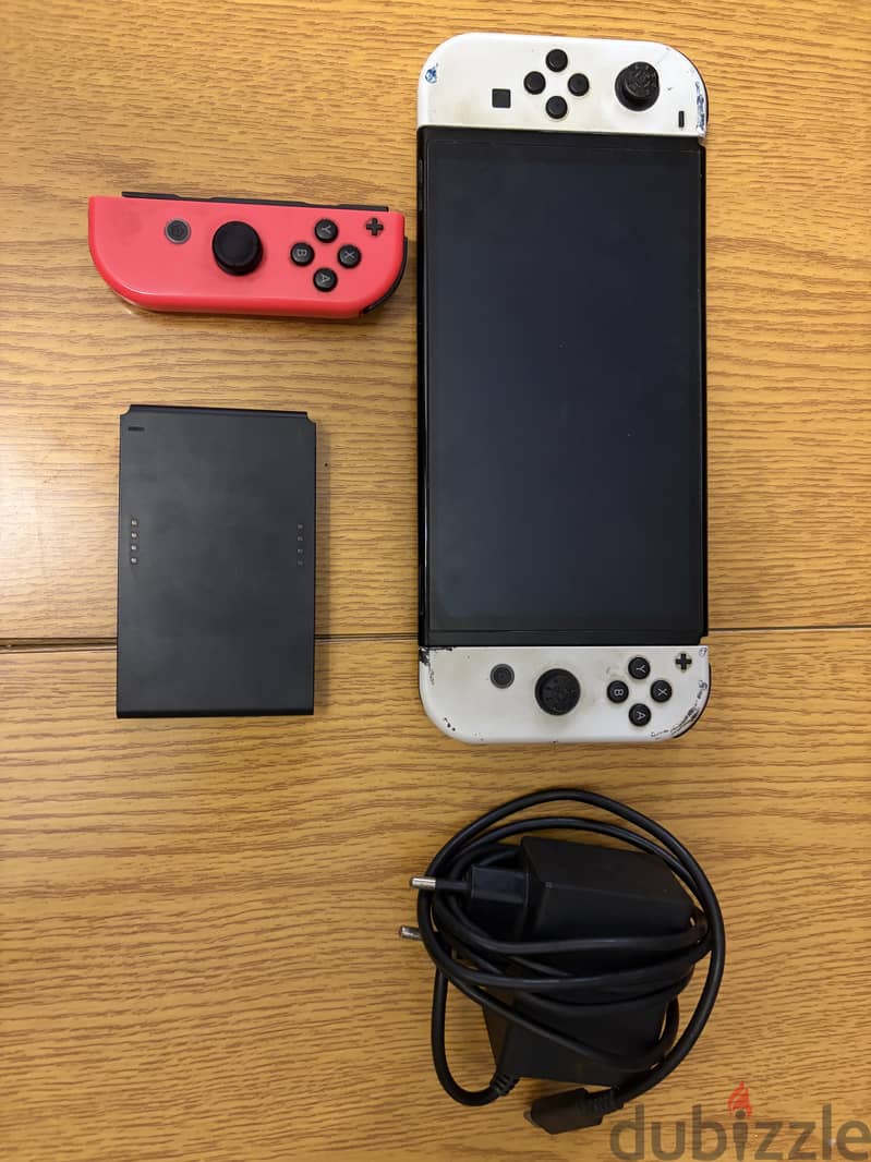 Nintendo Switch OLED with cover and 2 games 1