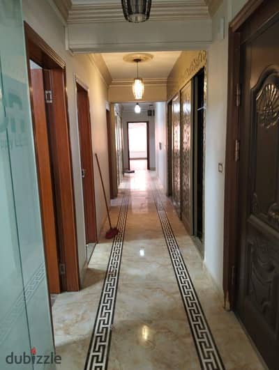 Office headquarters for sale in Royal Towers Mall, second floor with elevator, fully air-conditioned and at a bargain price. The office is in front of the monorail station and Lulu Hypermarket, directly on University Library Street, one minute from Al-Hosari Mosque, next to October Plaza Mall and Laicita Mall, and close to all services. The office consists of 6 rooms