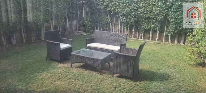 Modern furnished apartment ground floor with garden for rent in katameya heights