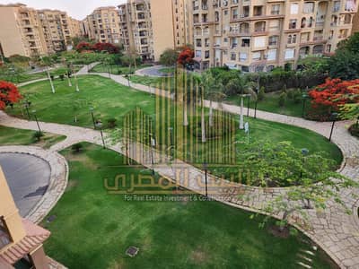 175 sqm apartment for rent in Madinaty; 4th-floor unit with a garden view.