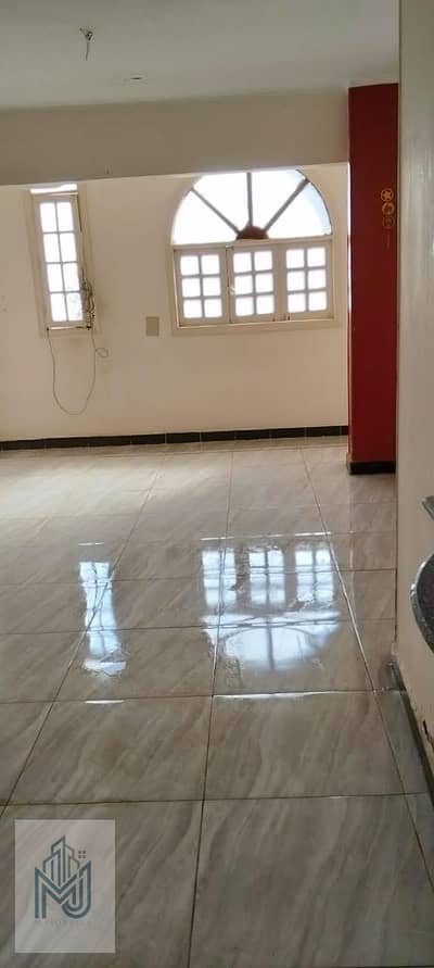 Apartment for sale in 6th of October, 4th District, first Street Al-Khazaan from the direction of Al-Kafrawi