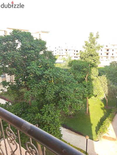 For rent, an apartment area of 99m in Al-Rehab 2 with a garden view