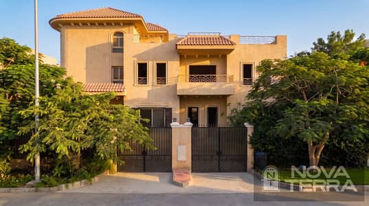 Twin house villa for sale in the Ninth District, Sheikh Zayed