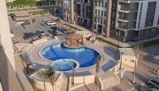 Fully furnished, high-end apartment for rent in Janna 1, Sheikh Zayed. It features full air conditioning, new furniture, a prime location, and a VIEW