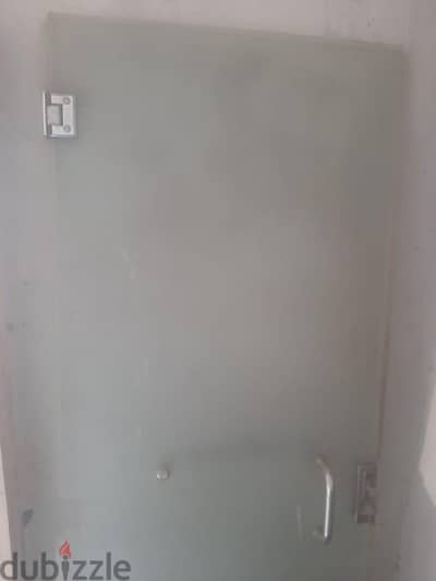 باب زجاج سيكوريت مقاس٢١٠سم في٨٠ سم جديد لم يستخدم بكل اكسسواراته