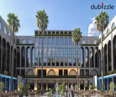 Ground shop 32m for sale in front of Hypermarket at Majan Mall, Zewail Road, opposite Zewail City - with a down payment of 481 thousands and installments over 7 years with delivery in 3 years