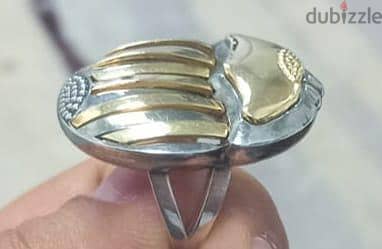 خاتم الكرنك من الفضه الاسترليني والذهب عيار ١٨