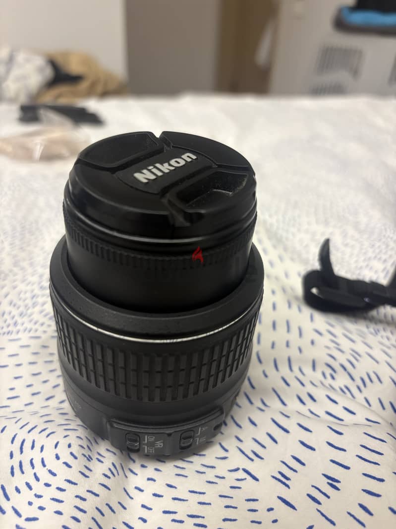 Nikon D3000 great condition with lens 2