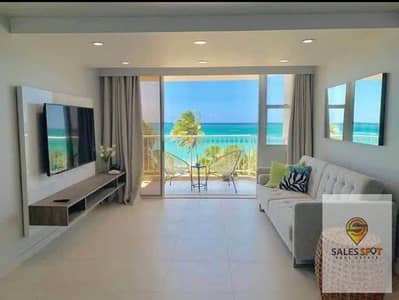 ready to move fully finished apartment in the Latin District  New Alamein City North first row on the lagoon  just minutes away from Marassi