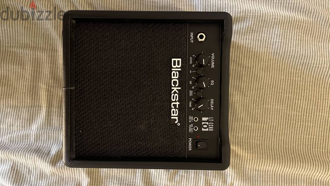 Squier Stratocaster by Fender + Blackstar Amplifier 5