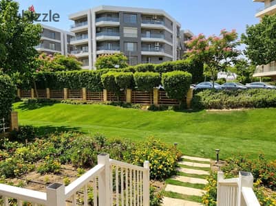 Last ground floor apartment with garden sale Taj City 10-year installments prime phase near Taj Sultan facing airport mins Saada Mountain View 1