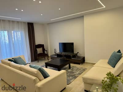 The best furnished ground-floor apartment with a garden for rent in Al Rehab City, Phase 7.