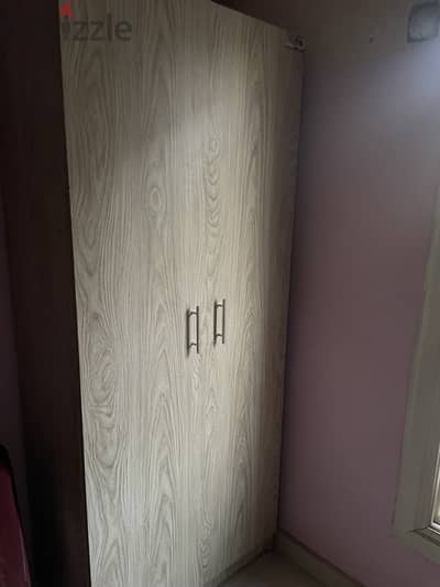 A two door wardrobe in used condition