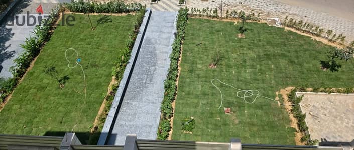 For rent (administrative or residential): Ground floor apartment with private garden in a strategic location in the heart of Sheikh Zayed