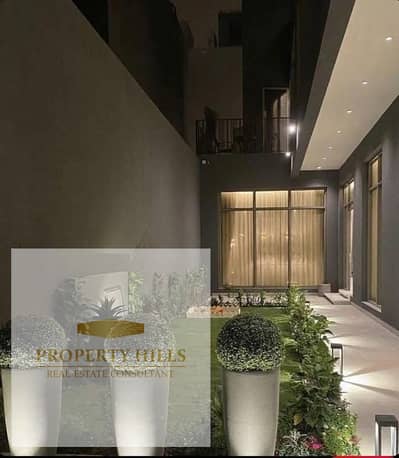 Less than its price, a furnished villa with a down payment (1,205,000) in the most upscale and highest community of villas only, not landscape Smart Club in the assembly.