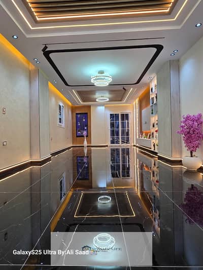 Apartment with a sea view, high finishing level for residential and investment purposes, next to the gate and the Al-Wahat road