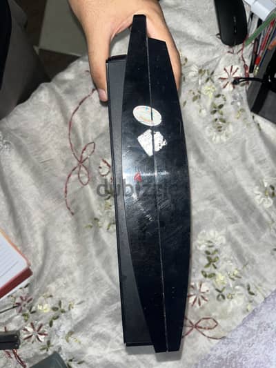 PS3 super slim  + 3 controllers 2 works as will