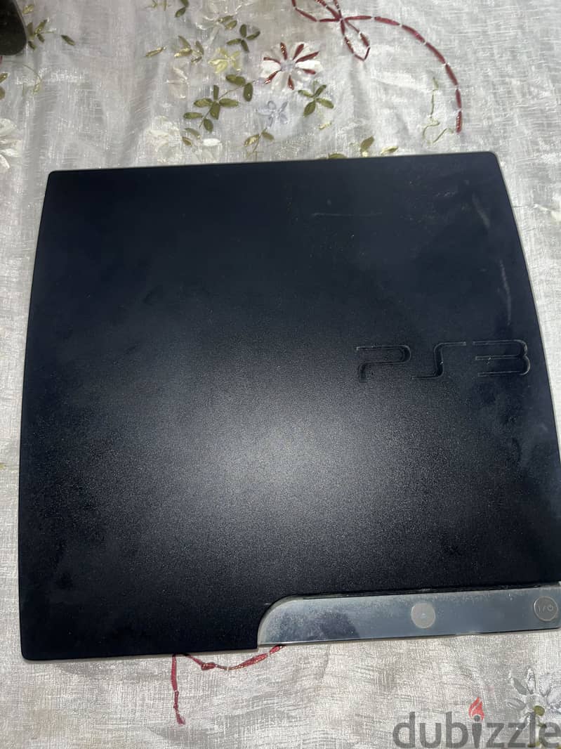 PS3 super slim  + 3 controllers 2 works as will 2