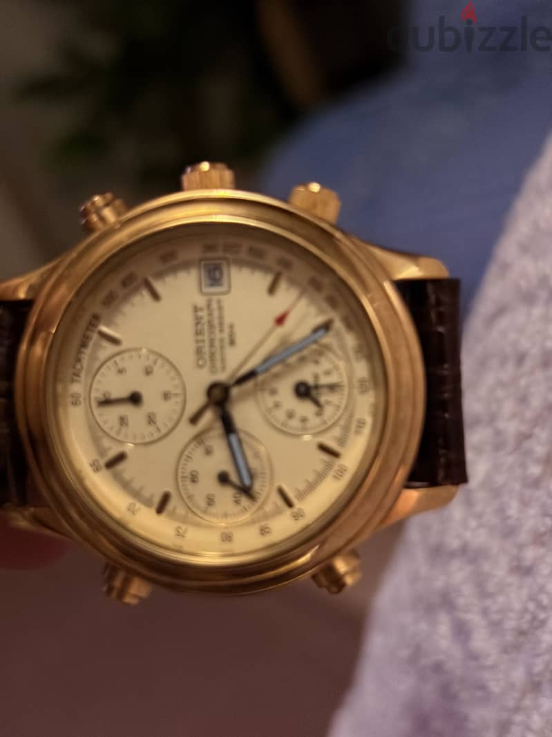 ساعه orient 1