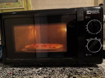 ميكروويف Home Tech بحالة الزيرو