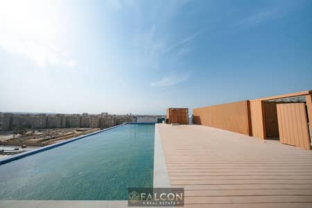 Hotel apartment for sale with the highest ROI in dollars open view in the heart of Heliopolis near the airport and mins to New Cairo and Rehab