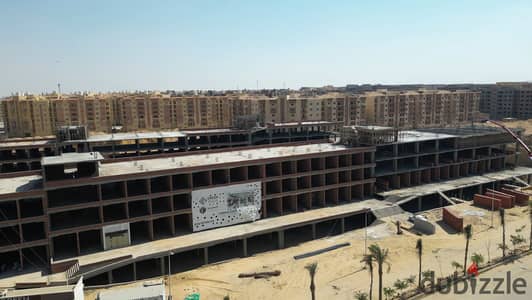 Own your commercial unit in El Nasr Square, Hadayek October, with just 30% down payment and extended payment plans.