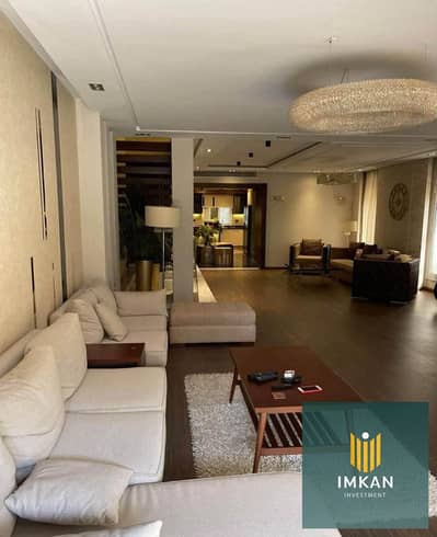 Apartment for sale in the "Mayan Compound" (Fifth Settlement, on Mohamed Naguib Axis). It features ultra-luxurious finishes and comprises two bedrooms
