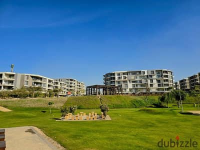 Front-facing apartment with a direct sea view overlooking golf courses for sale at a great discount Strategic location minutesfrom Taj City Nasr city